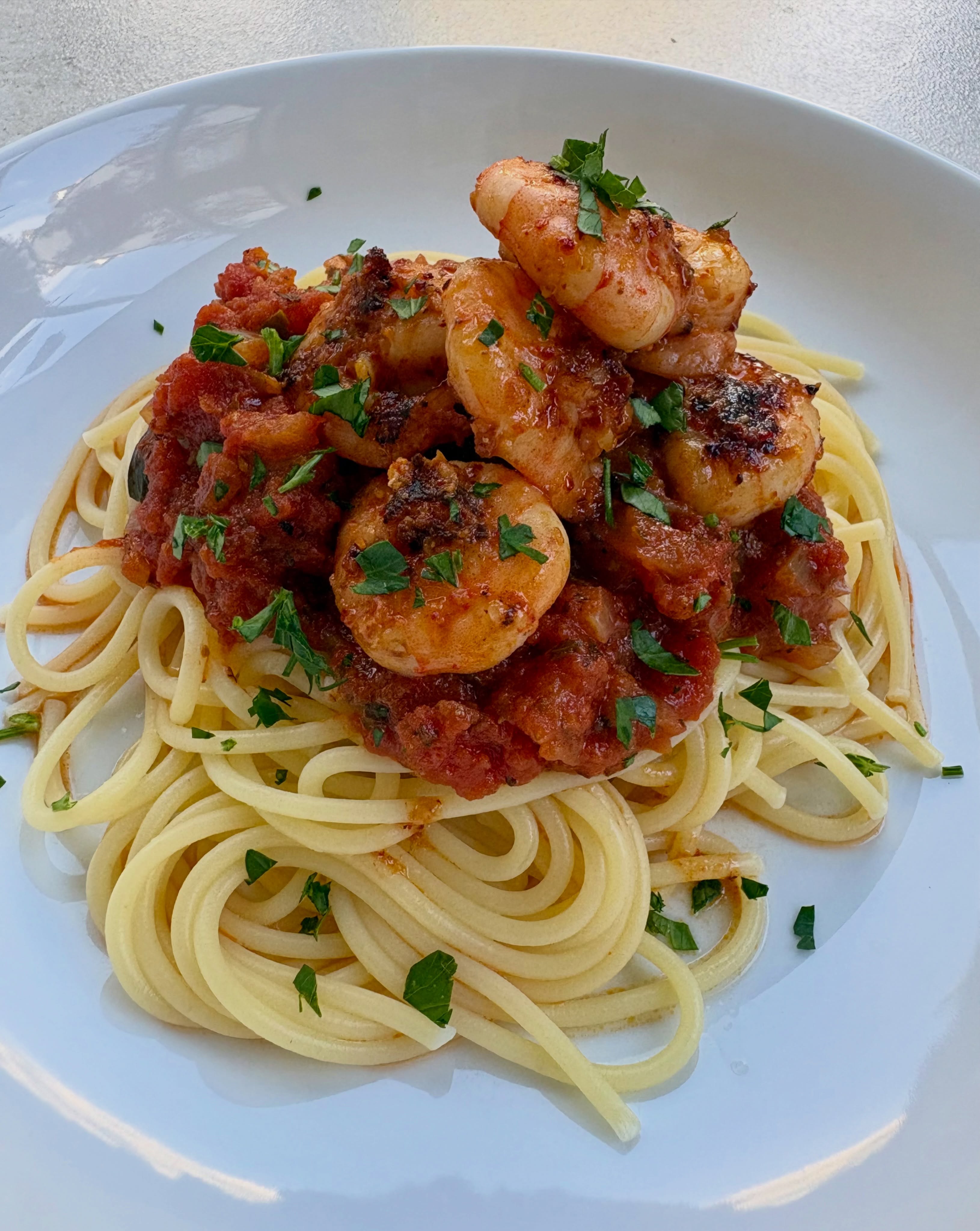 Okay so it’s official! I am addicted to Piment d’espelette, the spice I brought back from San Sebastián. I made these delicious Basque prawns again, and served them on spaghetti and a delicious homemade tomato sauce. The prawns are simply mixed with the spice, garlic and olive oil and pan fried, then finished with lemon juice and parsley. So good!
Basque prawn recipe on my website - https://www.georgesbristolkitchen.co.uk/basque-prawns
Tomato sauce recipes on my website - https://www.georgesbristolkitchen.co.uk/italian#Tomatosauces
#prawns #prawnpasta #basquefood