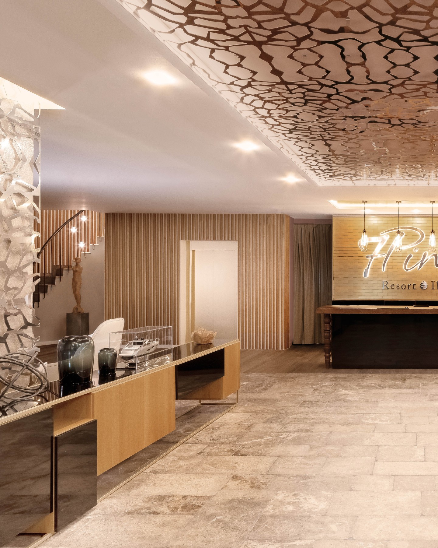 One of our favorites: 7Pines Resort Ibiza
Completed in 2018, the 7Pines Resort Ibiza, part of Destination by Hyatt, continues to be a project we're especially fond of.
The opportunity was to design public areas that didn't feel imposed on the landscape, spaces that read as native to the island rather than layered on top of it. Each space was conceived to feel like part of its surroundings, not set against them.
Rather than treating materials as decoration, the public areas were built around a dialogue between raw and smooth surfaces, natural textures, and shifting heights, immersing the design into its environment. Across the lobby, bars and restaurants, this plays out differently in every space, yet always circles back to the same idea.