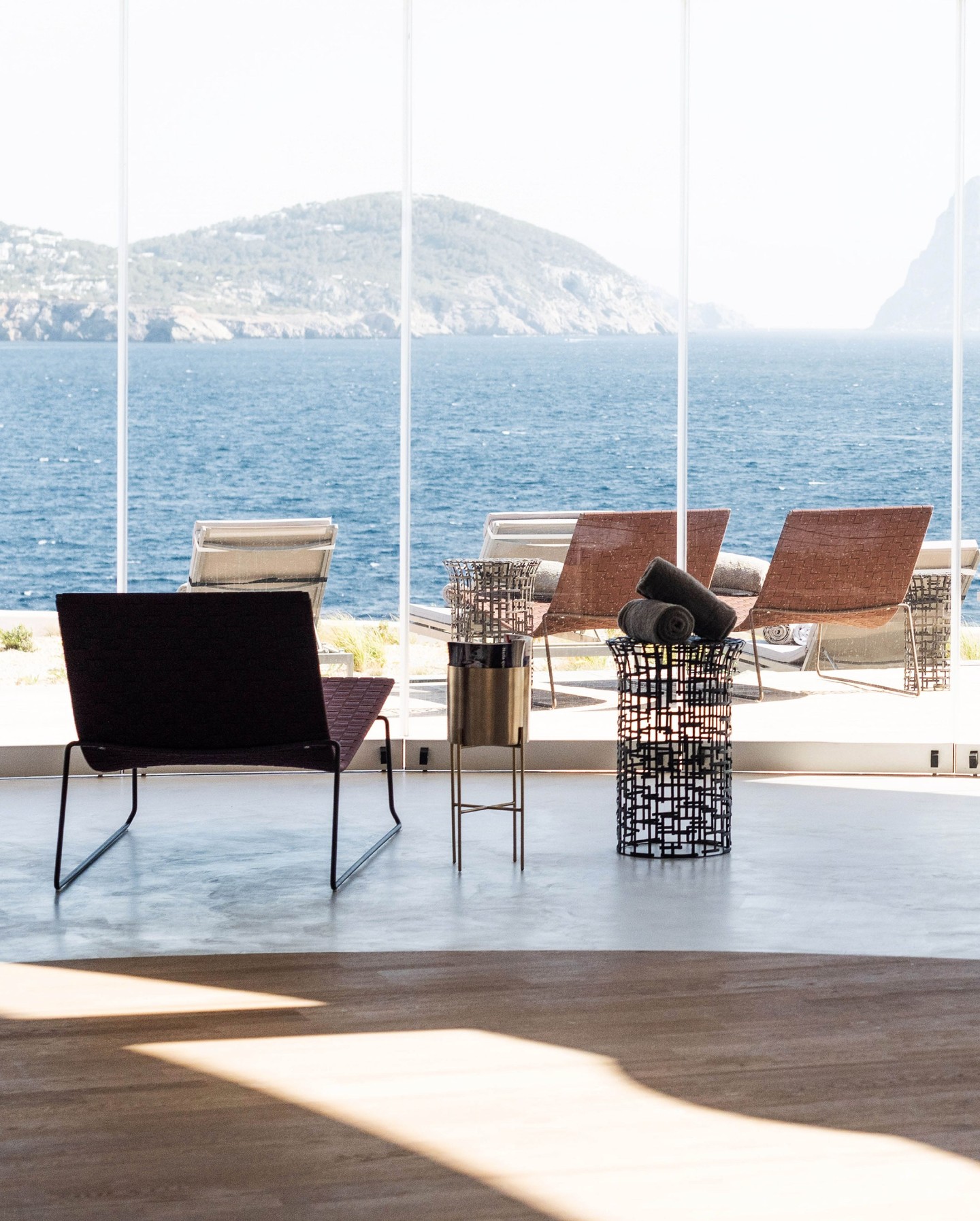One of our favorites: 7Pines Resort Ibiza
Completed in 2018, the 7Pines Resort Ibiza, part of Destination by Hyatt, continues to be a project we're especially fond of.
The opportunity was to design public areas that didn't feel imposed on the landscape, spaces that read as native to the island rather than layered on top of it. Each space was conceived to feel like part of its surroundings, not set against them.
Rather than treating materials as decoration, the public areas were built around a dialogue between raw and smooth surfaces, natural textures, and shifting heights, immersing the design into its environment. Across the lobby, bars and restaurants, this plays out differently in every space, yet always circles back to the same idea.